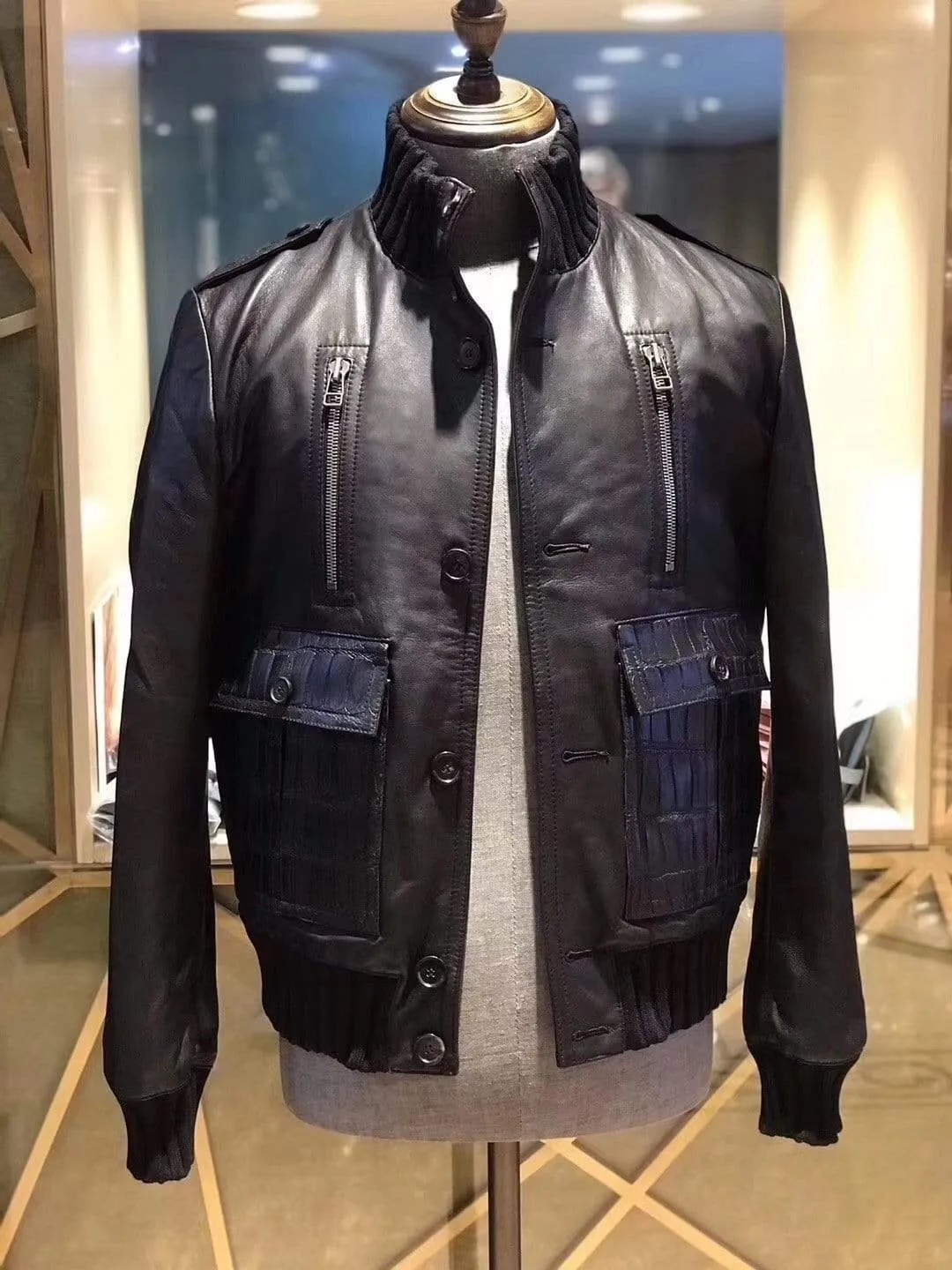 Black Leather Jacket Trimmed With The Classic Ribbed Jersey Cuffs, Collar