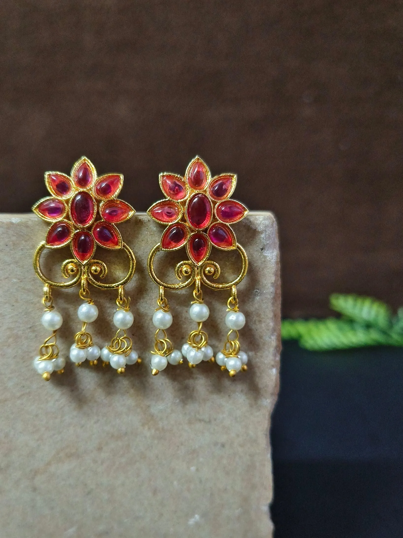 Golden Party Wear Stud Earrings with Pearl Drops & Stone Work | Sarichka