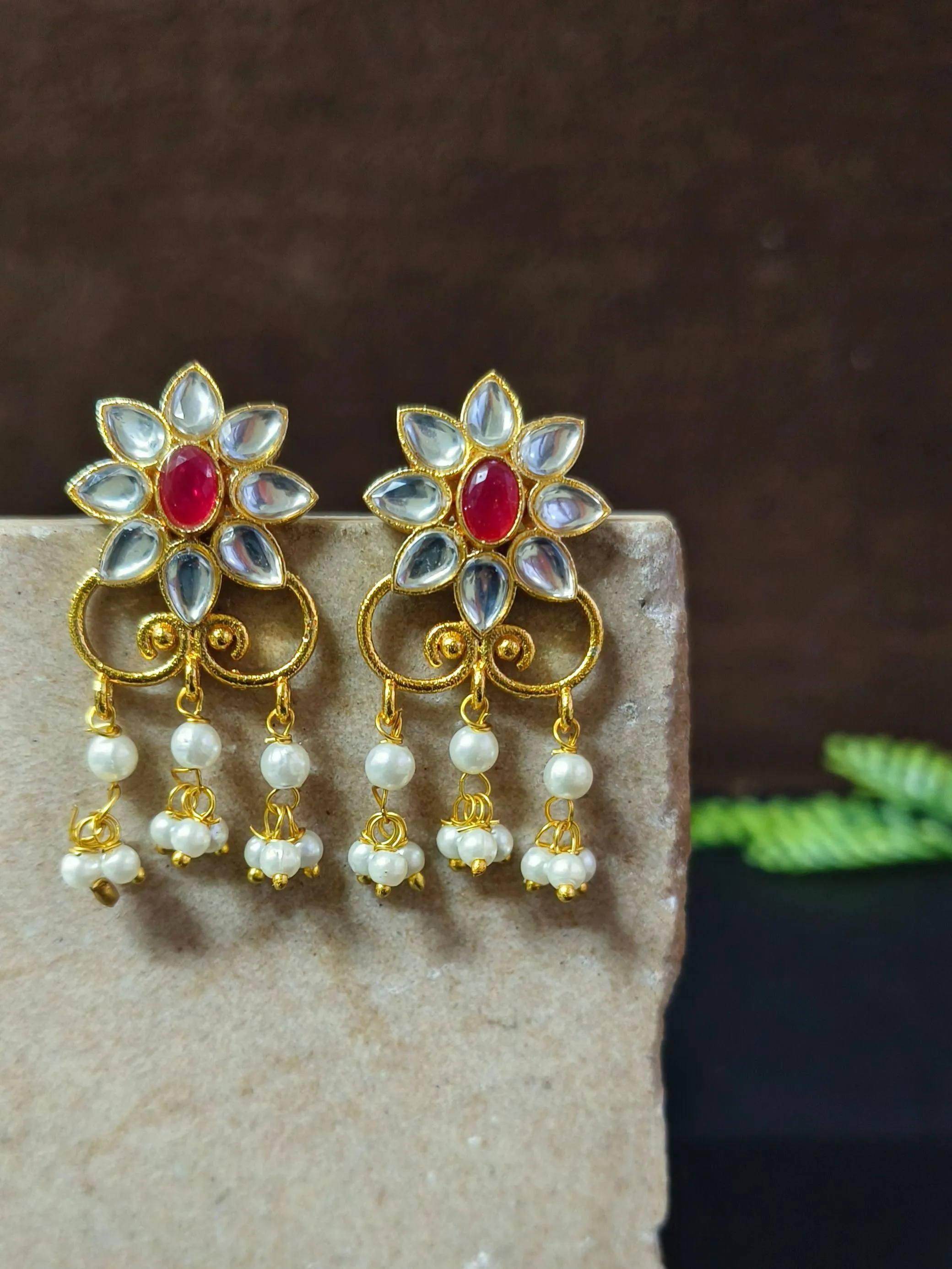 Golden Party Wear Stud Earrings with Pearl Drops & Stone Work | Sarichka